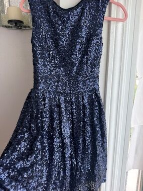 Emerald Sundae dress featuring a striking dark blue sequin design.